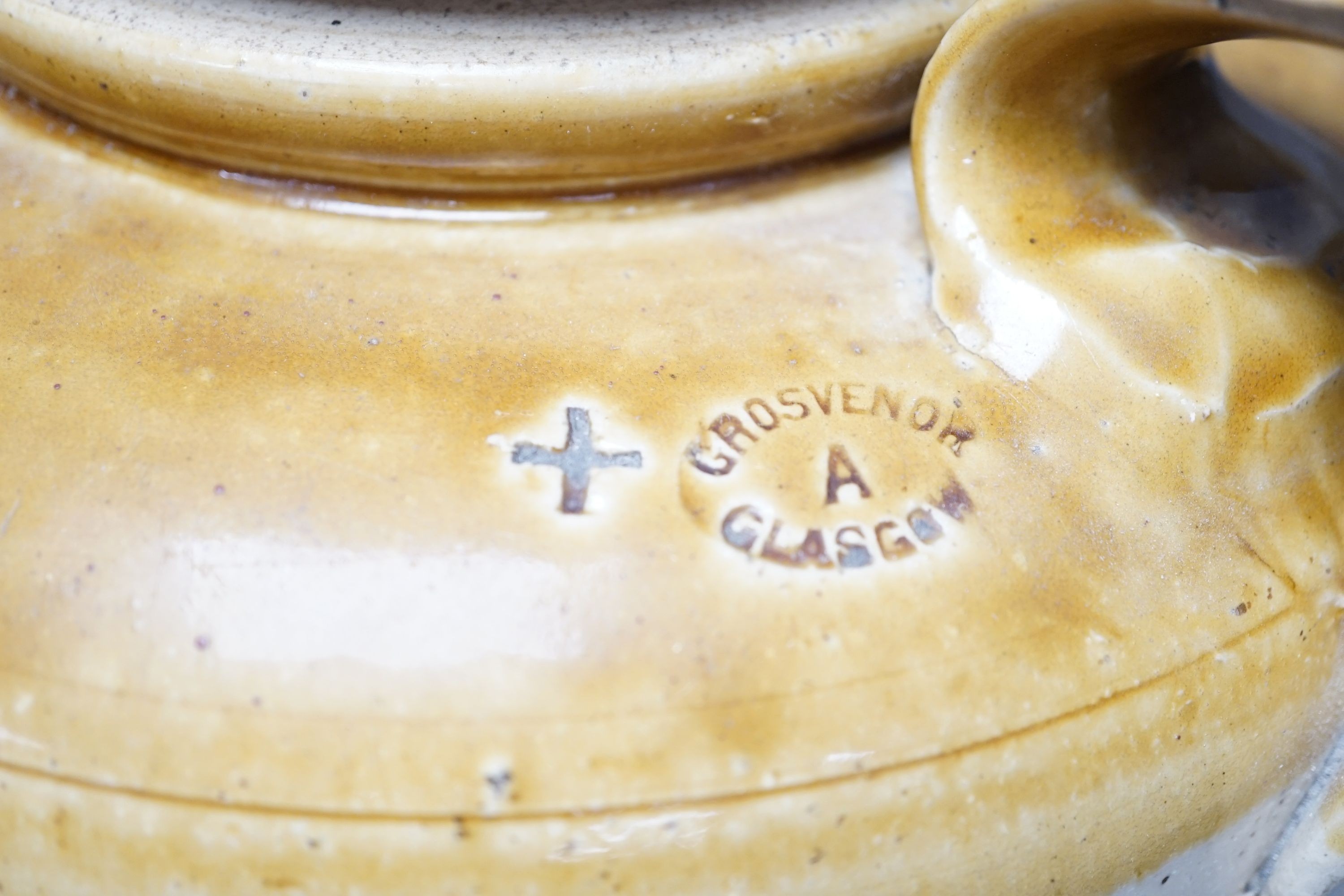 A Grosvenor Glasgow stoneware beer, storage jar, 37 cms high.